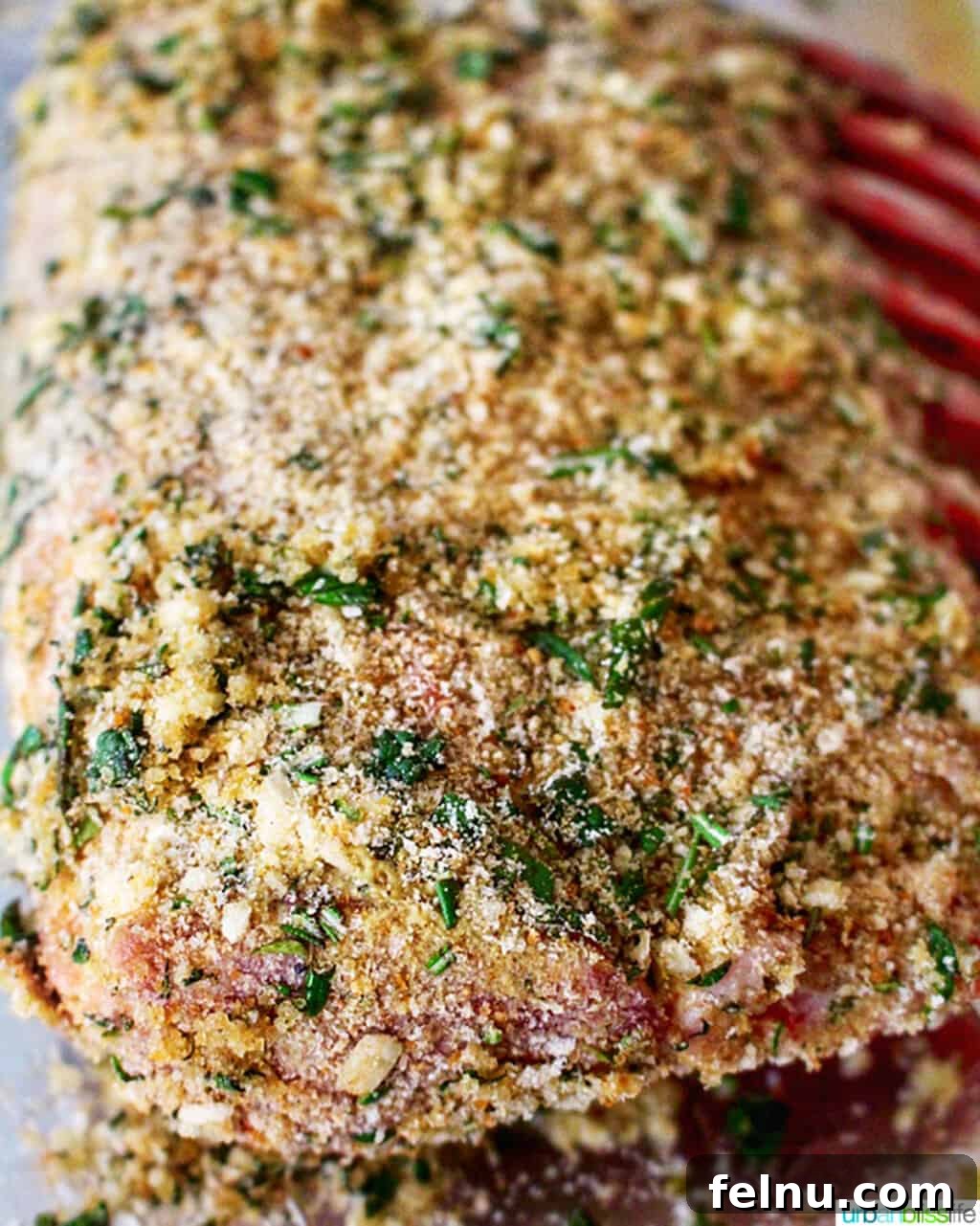 Aromatic Herb-Crusted Lamb Rack with Sweet-Tart Blackberry Balsamic 6 Rack of lamb fully coated with a vibrant herb and breadcrumb crust