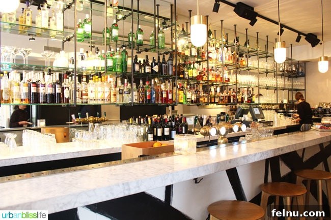 Unlock Your Perfect Amsterdam Stay 6 Chic bar area at Morgan & Mees hotel, featuring a warm and inviting glow
