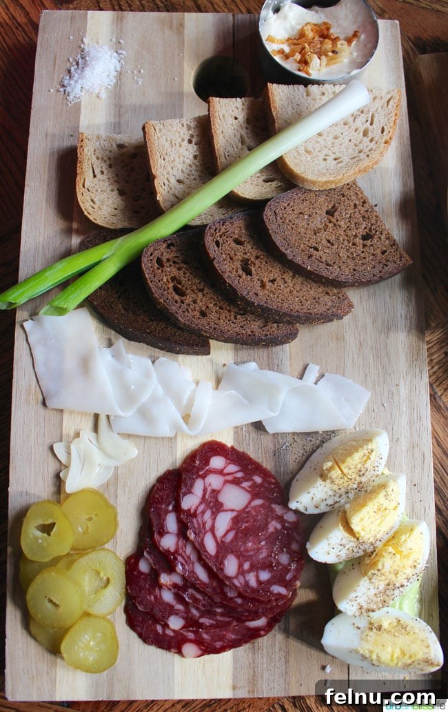Kachka: Portland's Heart of Russian Cuisine 4 Slava's Drinking Board at Kachka restaurant in Portland, Oregon: a perfect happy hour platter featuring house-made pickles, cured meats, and Russian cheese. Discover authentic Russian food on UrbanBlissLife.com.