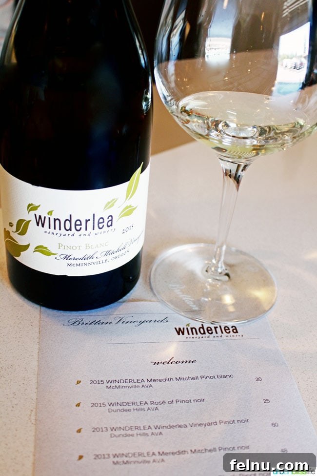 Sip and Stroll McMinnville 6 A glass of Winderlea Pinot Blanc, a crisp and refreshing wine from Oregon.