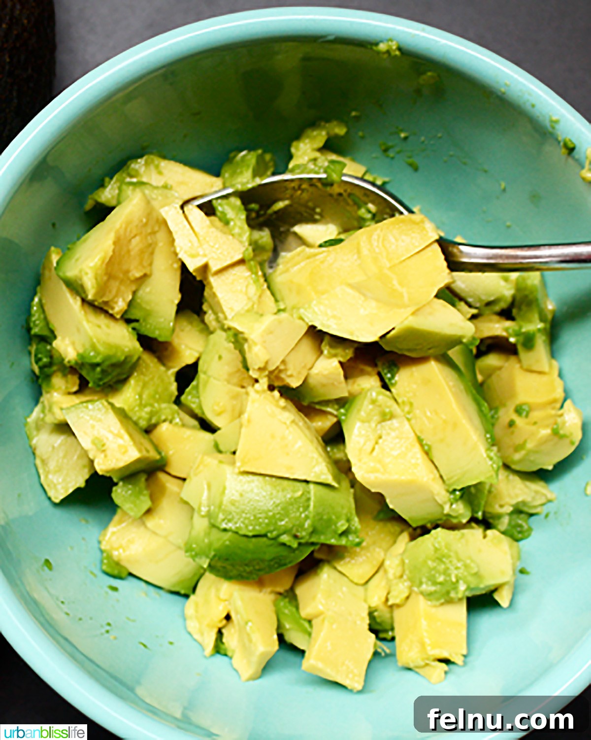 Creamy Avocado Pesto 5 crushed avocado in a bowl