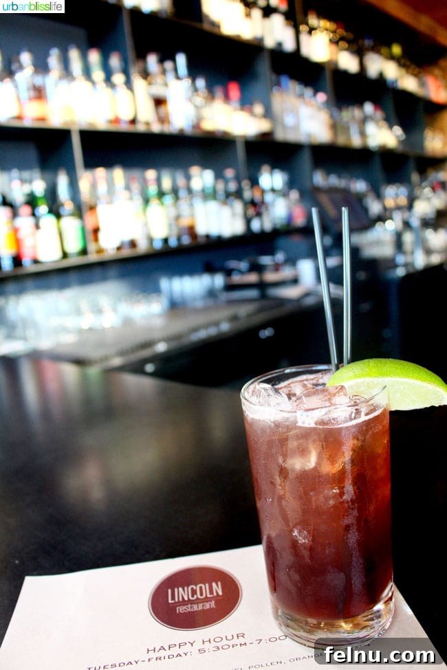 The bar area at Lincoln Restaurant, showcasing a relaxed and inviting space for enjoying happy hour.