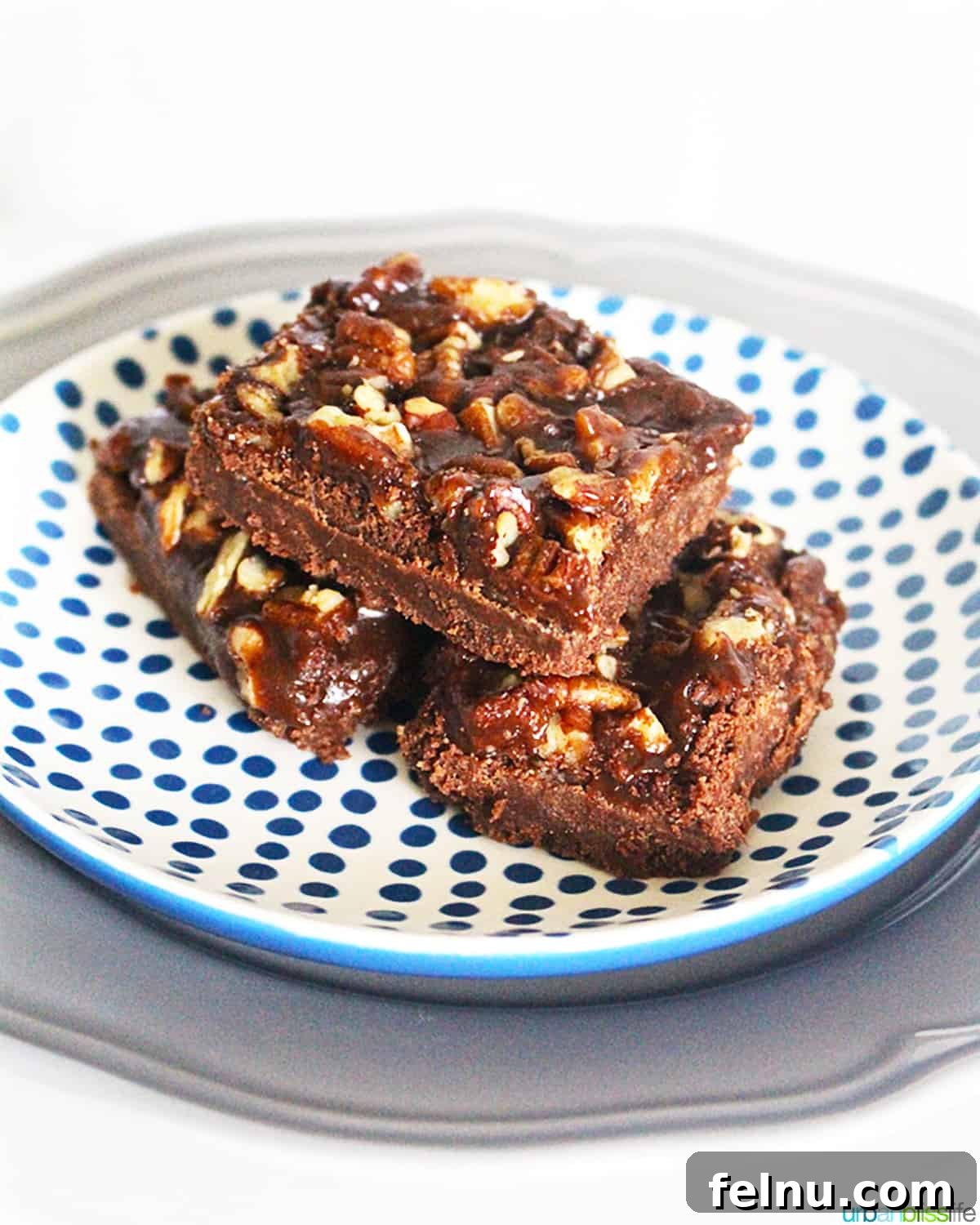 Salted Caramel Dark Chocolate Dream Bars 2 Salted caramel chocolate bars on a plate