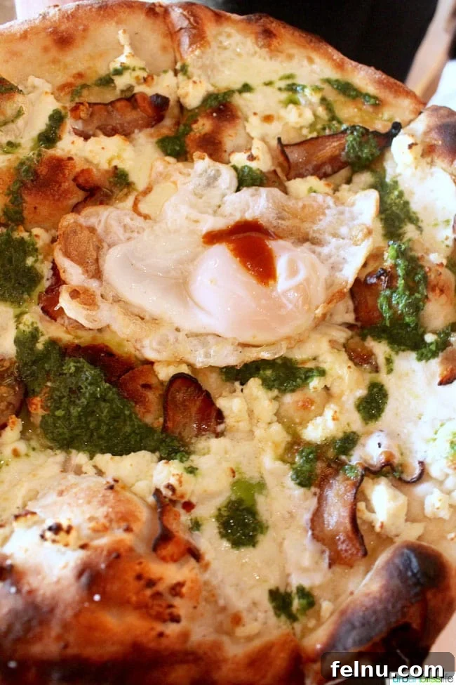 Rally Pizza: Vancouver WA's Top Pizza Destination 8 Rally Pizza Piggy Back Pizza Topped with a Fried Duck Egg: An irresistible combination.