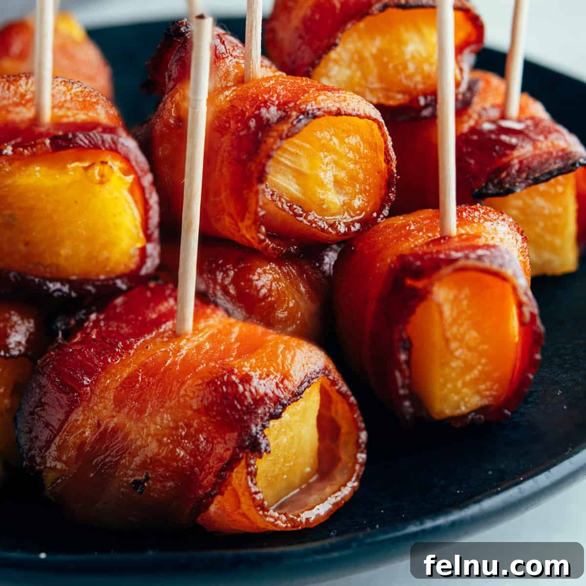 The Ultimate Football Feast: Delicious Finger Foods for Game Day 13 Bacon Wrapped Pineapple