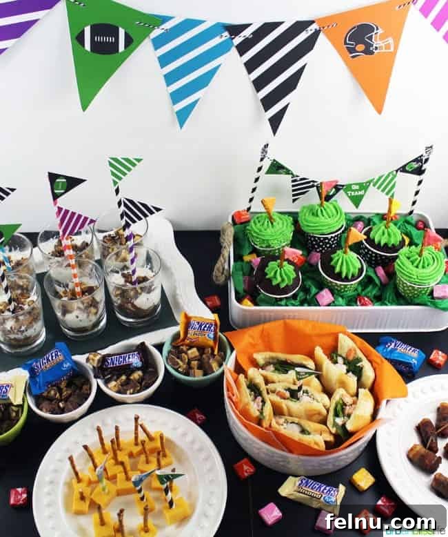 The Ultimate Football Feast: Delicious Finger Foods for Game Day 59 Snickers Touchdown Towers & Starburst Pretzel Flags