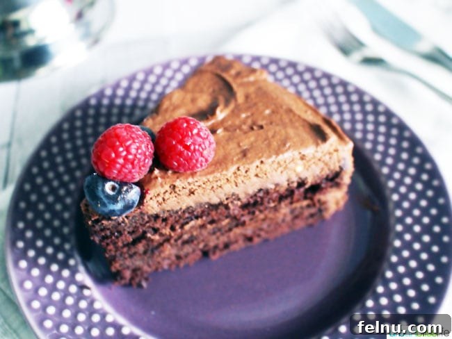 25 Irresistible Valentine's Day Treats and Sips 3 A slice of rich, dark vegan chocolate cake, perfect for Valentine's Day.