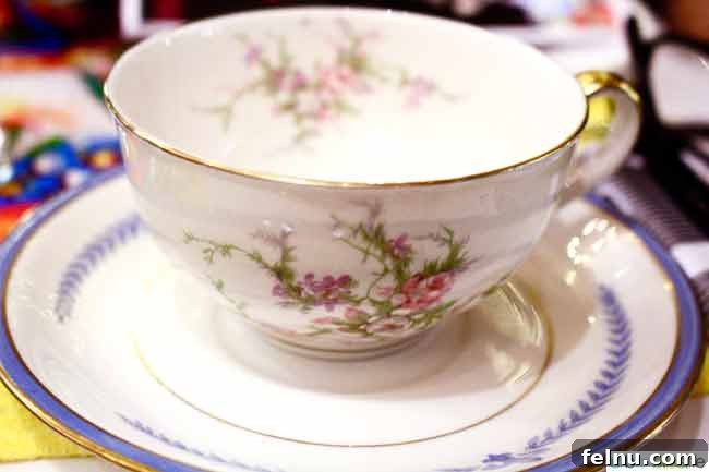 Headwaters Elevates Its Russian Tea Experience in Portland, Oregon 3 Close-up of a delicate teacup, part of the elegant Russian Tea Service at the Heathman Hotel in Portland, Oregon, shared on UrbanBlissLife.com.