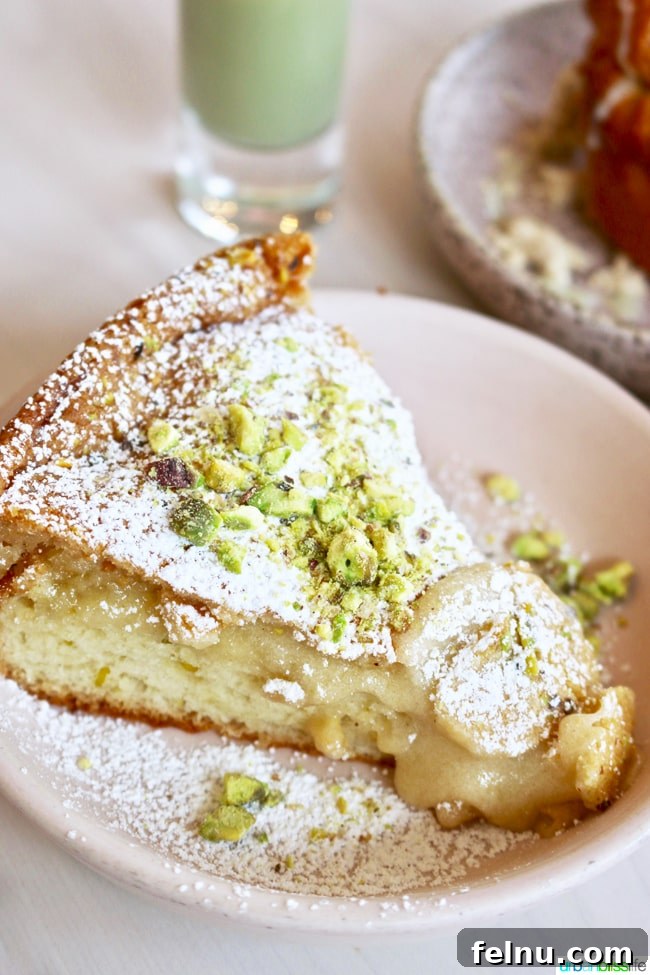 Middle Eastern Brunch Magic at Tusk 14 The decadent Pistachio Gooey Butter Cake at Tusk, served with a dusting of powdered sugar and a rich, buttery crust.