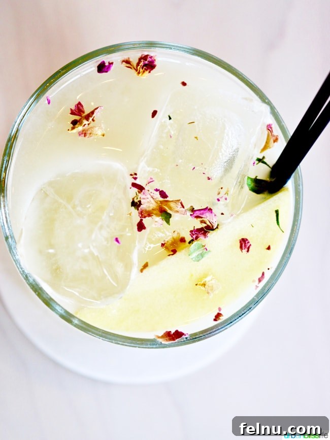 Middle Eastern Brunch Magic at Tusk 9 The Eastern Maid cocktail at Tusk, featuring a delicate garnish and unique ingredients like rose water and yogurt, presented elegantly.