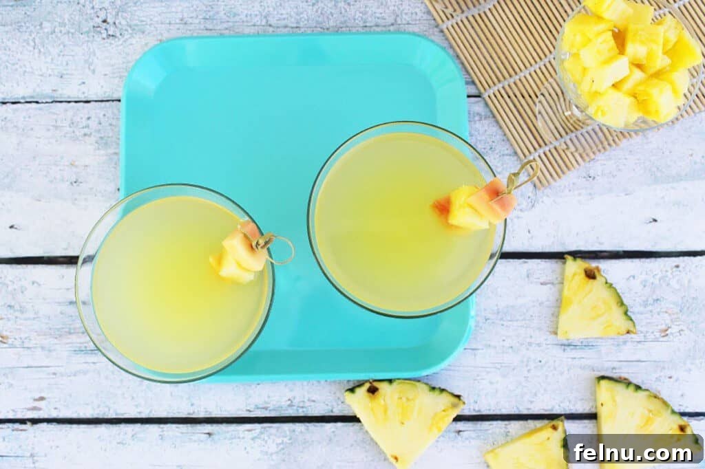 Vibrant Sips: Fruity Cocktail Recipes to Welcome Spring & Summer 18 Pineapple saketini