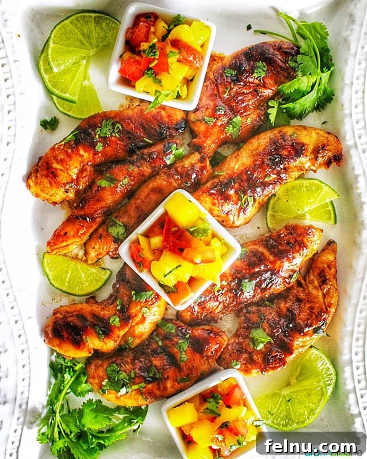 Vibrant Sips: Fruity Cocktail Recipes to Welcome Spring & Summer 25 Grilled Pineapple Chicken on a platter