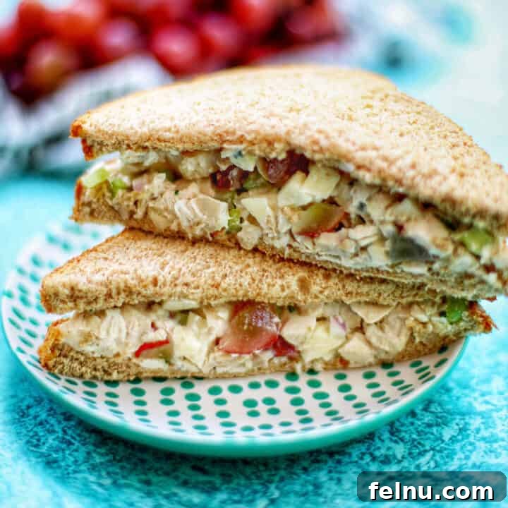 Dainty Chicken Salad Tea Bites 10 Classic chicken salad sandwiches stacked elegantly.