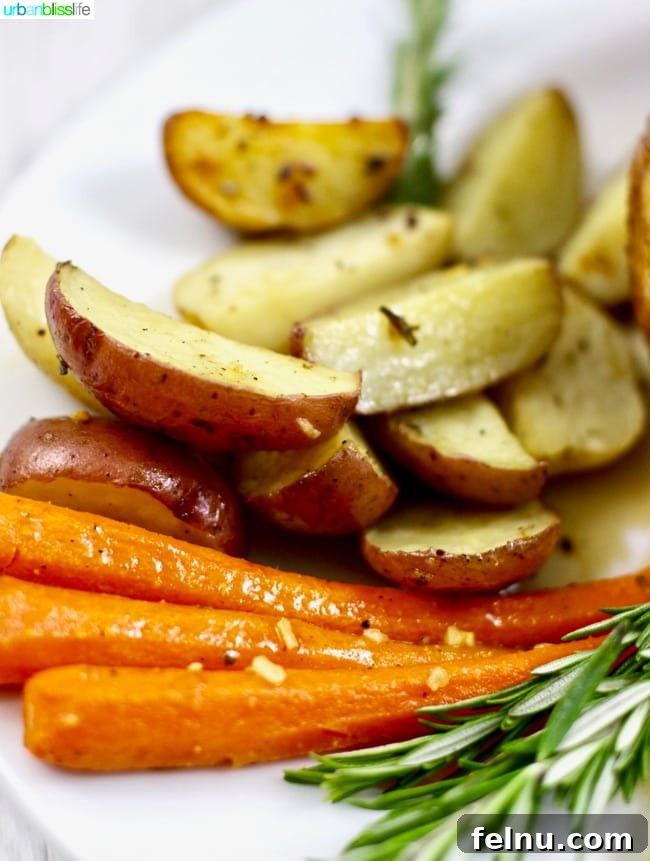 Classic Lemon Herb Roasted Chicken and Veggies 11 Roasted Vegetables including potatoes, carrots, and asparagus.