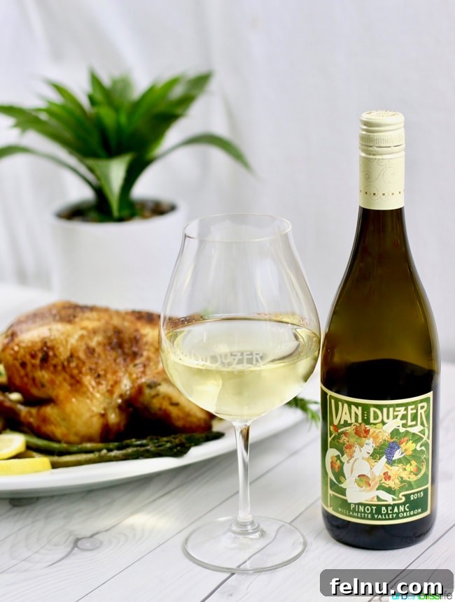 Classic Lemon Herb Roasted Chicken and Veggies 13 A bottle of White Wine with Lemon Herb Roasted Chicken
