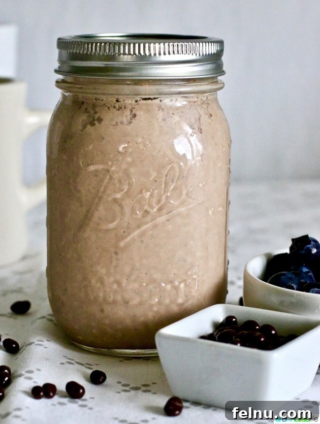 Chocolate Peanut Butter Overnight Oats in a mason jar, ready to eat