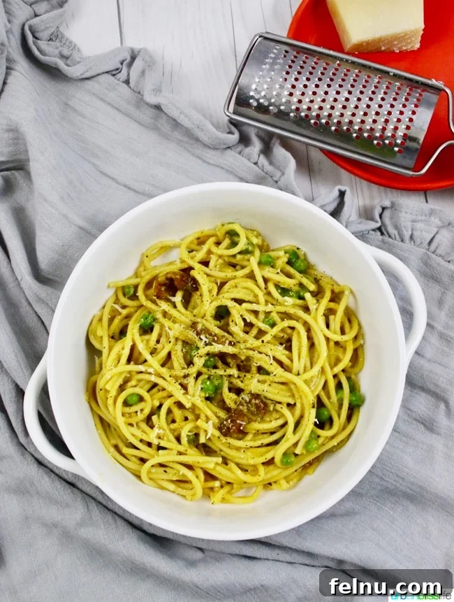 Golden Turmeric Pasta with Smoky Bacon and Sweet Peas 7 A full plate of delicious Turmeric Pasta with Bacon and Peas.