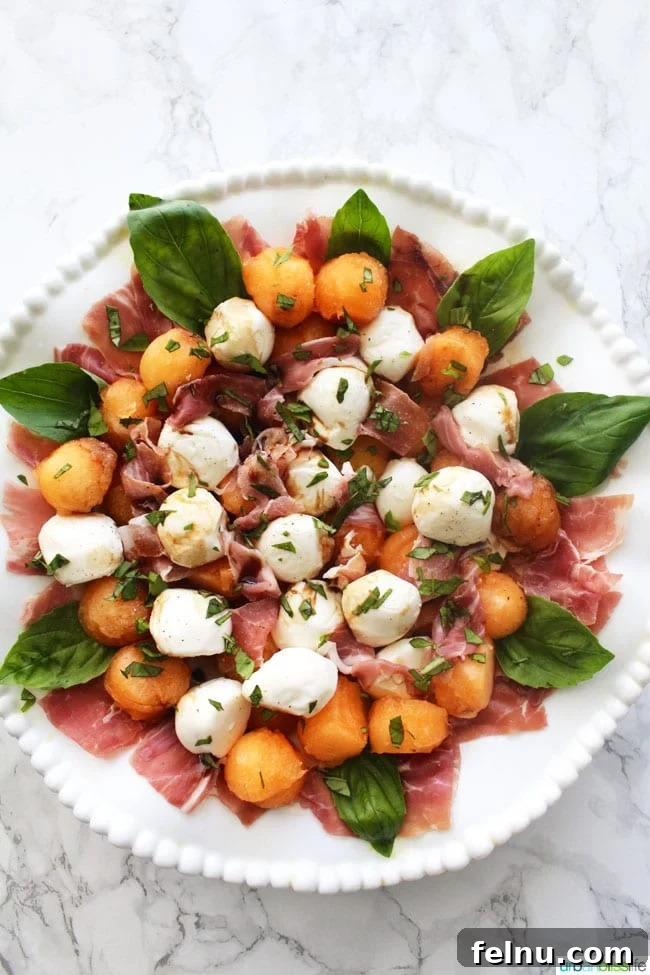 Pillowy Homemade Sweet Mallows 12 Summer Melon & Prosciutto Caprese Salad is perfect for barbecues and picnics! Recipe on UrbanBlissLife.com