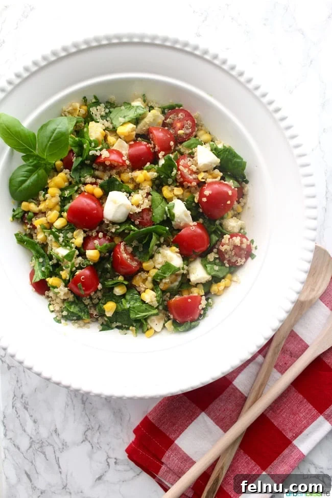 Creamy Tomato Flatbread Pizza Delight 7 Vibrant Summer Corn Quinoa Caprese Salad, combining fresh corn, quinoa, tomatoes, mozzarella, and basil.