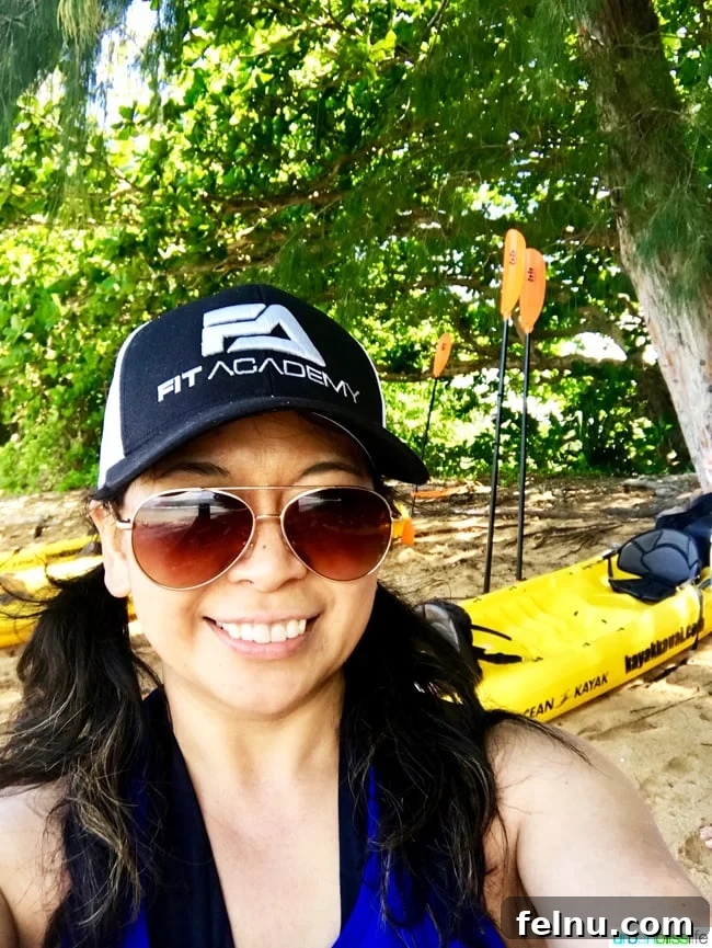 Dive Soar Paddle Kauai's Ultimate Adventure 16 Kayaking in Kauai Hawaii - enjoying a break on a secluded beach with kayaks