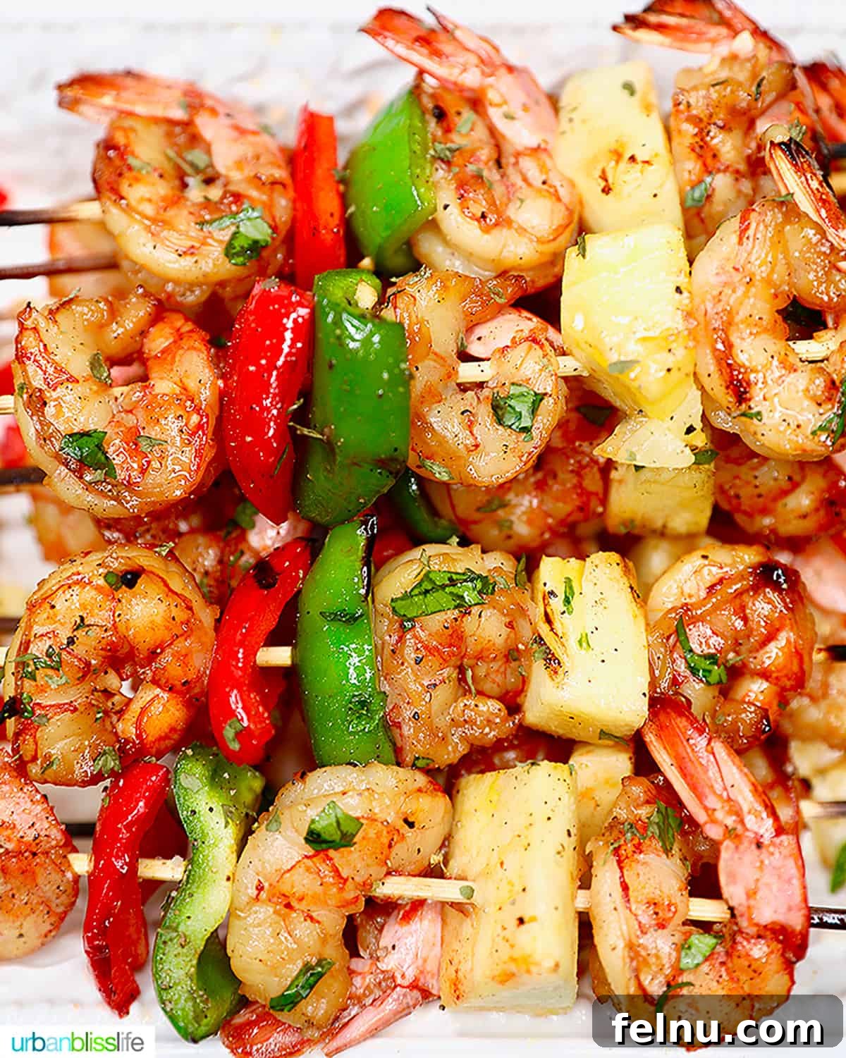 Sip, Sizzle, Savor: Wines That Perfect Your BBQ 15 Delicious grilled shrimp skewers, interspersed with vibrant pineapple chunks and colorful peppers, ready to be enjoyed.