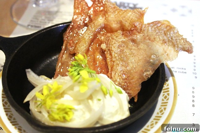 Party Downtown: Eugene, Oregon's Must-Visit for Exceptional Dining and Catering 5 Crispy fried chicken skin, a unique starter at Party Downtown in Eugene, Oregon. Places to eat in Eugene.