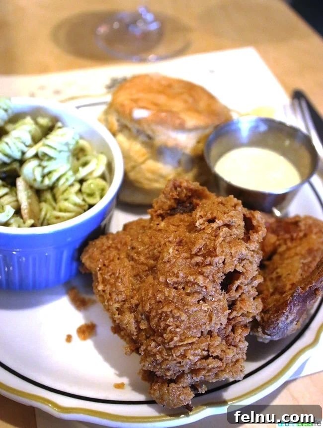 Party Downtown: Eugene, Oregon's Must-Visit for Exceptional Dining and Catering 6 Southern-style fried chicken with two sides at Party Downtown, a top restaurant in Eugene. Places to eat in Eugene.