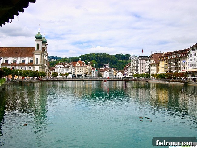 Lucerne Family Fun: Top Activities with Kids 2 Picturesque view of Lucerne, Switzerland, showcasing its charming cityscape and stunning natural backdrop.