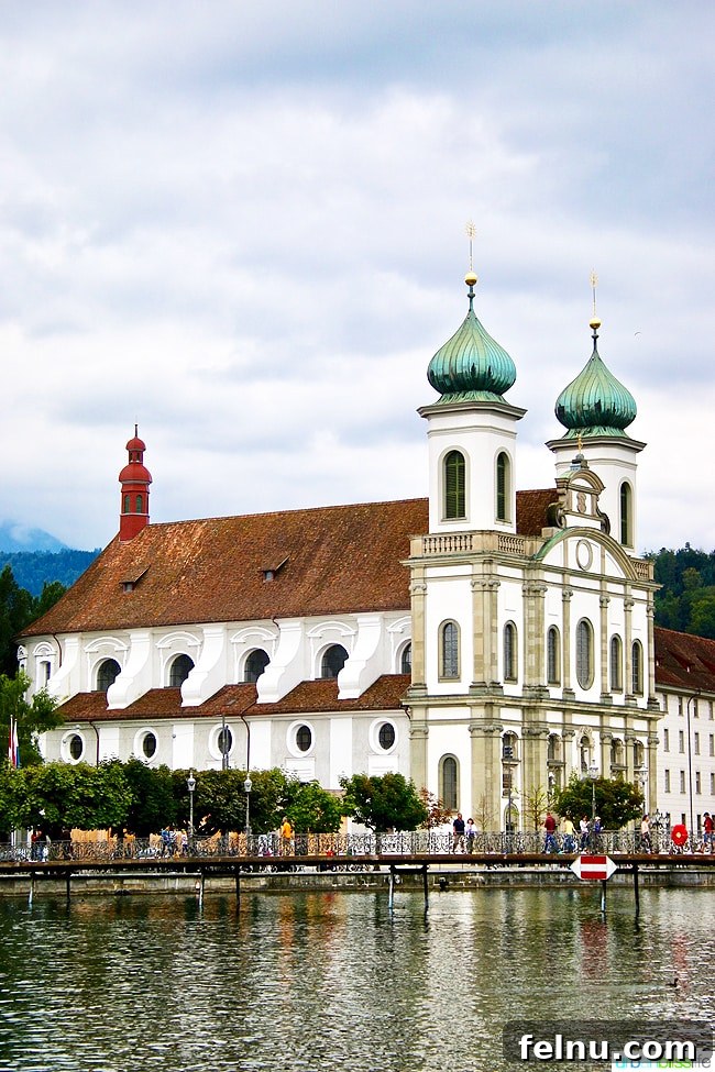 Lucerne Family Fun: Top Activities with Kids 5 The Church of St. Leodegar (Hofkirche) in Lucerne, its impressive twin towers a testament to the city's rich religious history.