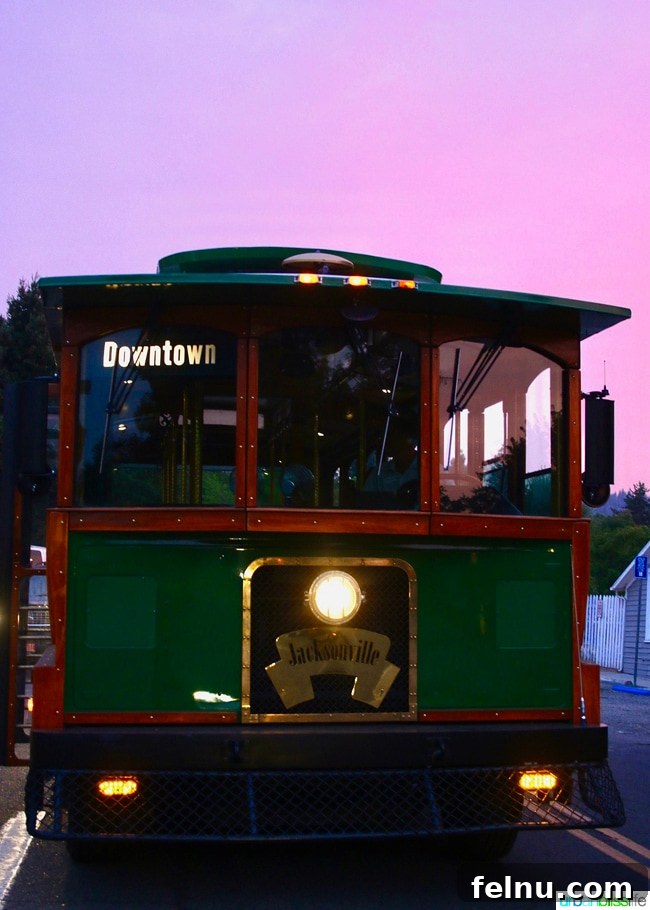 Jacksonville Oregon Food Lodging and Entertainment 13 Jacksonville, Oregon trolley against a beautiful sunset, inviting visitors to explore the town.