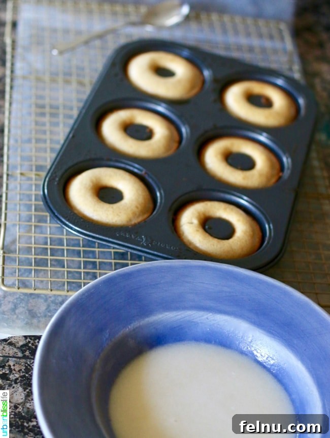 Ingredients for making baked cinnamon sugar donuts, including flour, sugar, and spices.