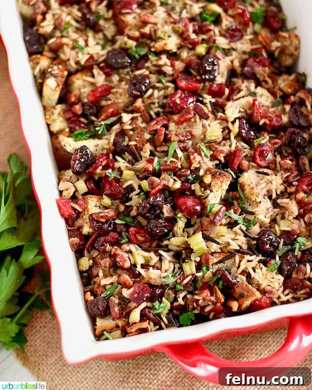 A Festive Harvest Stuffing 3 Side view of cranberry stuffing with wild rice and cherries in a casserole dish