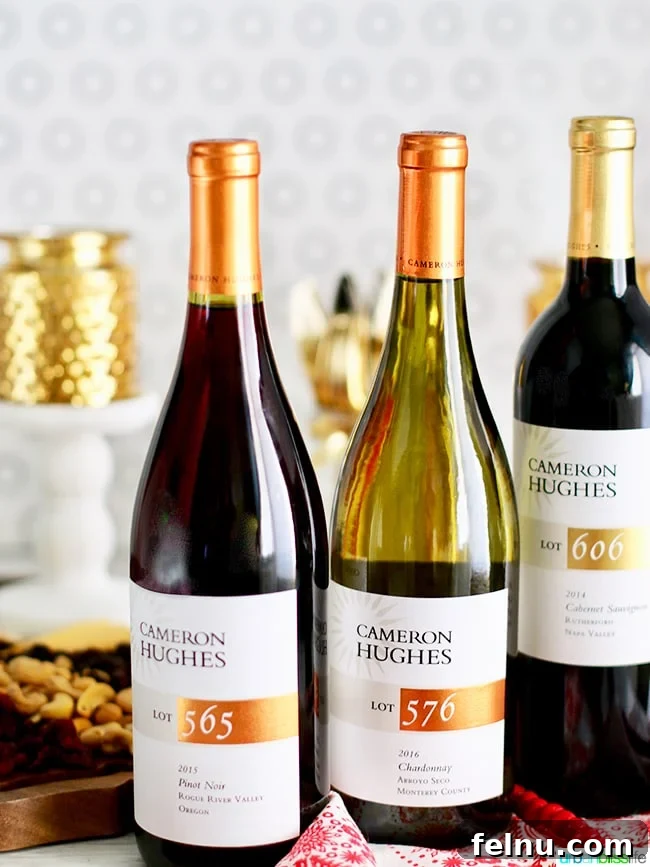 Uncorking Holiday Joy: The Art of Wine Pairing Parties 4 Three bottles of Cameron Hughes wine for a tasting. UrbanBlissLife.com
