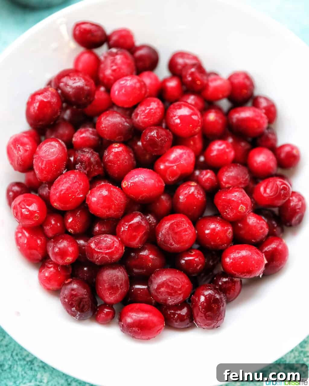 Sweet and Tangy Cranberry Glazed Meatballs 6 fresh cranberries in a pot