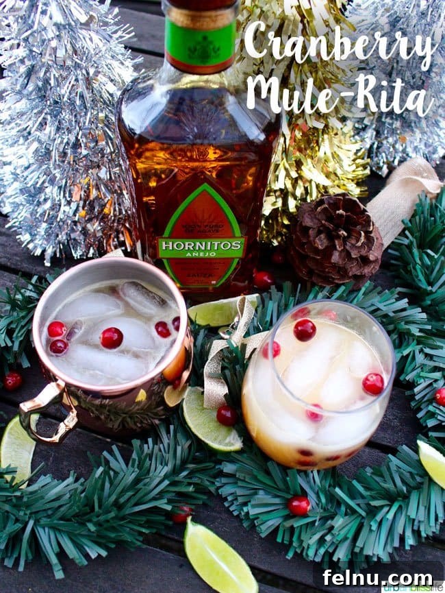 Festive Winter Sips: 20 Cocktail Recipes for Your Holiday Gathering 6 Refreshing Cranberry Mule-Rita in a copper mug, garnished with cranberries and mint.