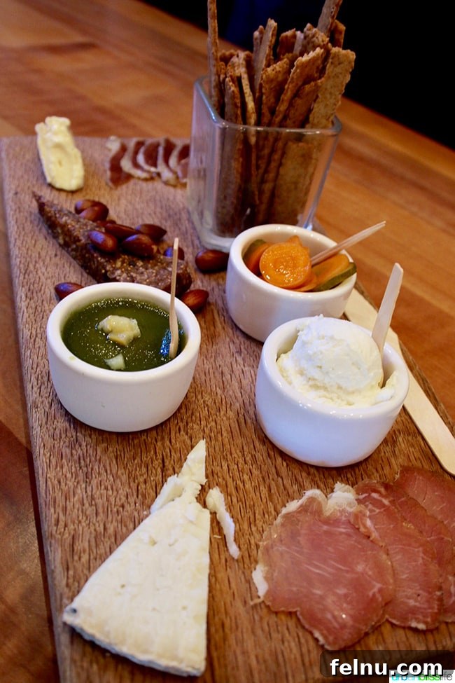 Wooldridge Creek: A Taste of Oregon's Applegate Valley 9 A beautifully arranged charcuterie board featuring artisan cheeses and house-made meats at Wooldridge Creek Winery, Grants Pass, Oregon.