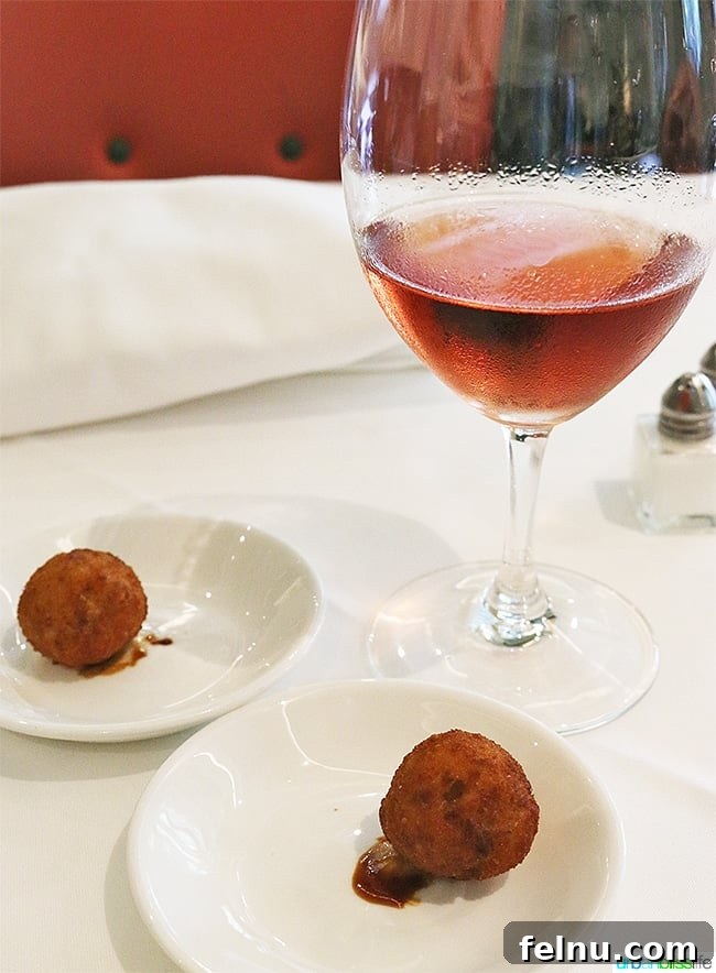 A Taste of New Orleans: Brennan's Culinary Legacy 10 A glass of wine served as an amuse-bouche at Brennan's Restaurant