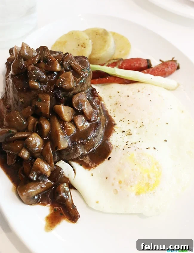 A Taste of New Orleans: Brennan's Culinary Legacy 13 The plated Steak Diane, ready to be enjoyed at Brennan's Restaurant