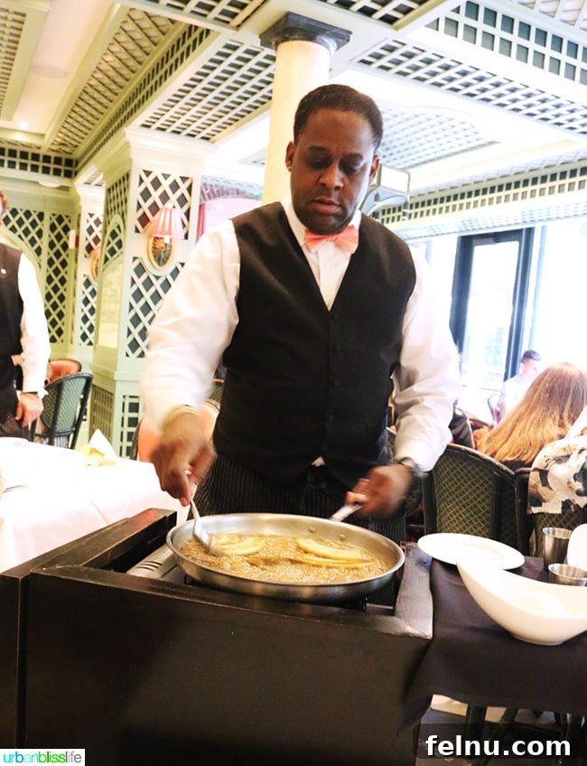 A Taste of New Orleans: Brennan's Culinary Legacy 15 A waiter preparing Bananas Foster tableside at Brennan's Restaurant