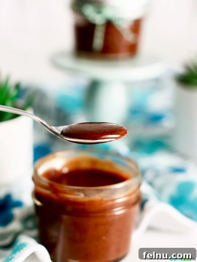Homemade Nutella: A Decadent Chocolate Hazelnut Dream 3 Close-up of Chocolate Hazelnut Spread on a Spoon
