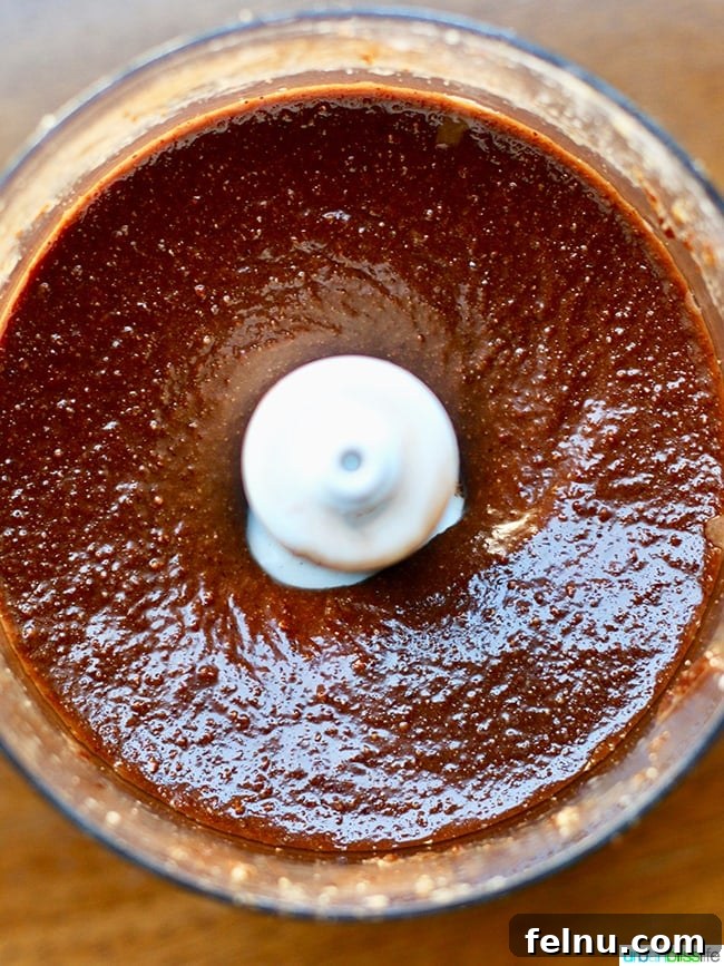 Homemade Nutella: A Decadent Chocolate Hazelnut Dream 6 Hazelnuts Being Processed in a Food Processor