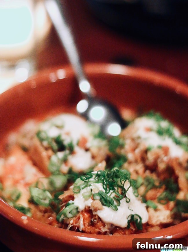 Albondigas, delicious chicken meatballs with flint corn, tahina, miti-crema, and crispy chicken skin at Bar Casa Vale.