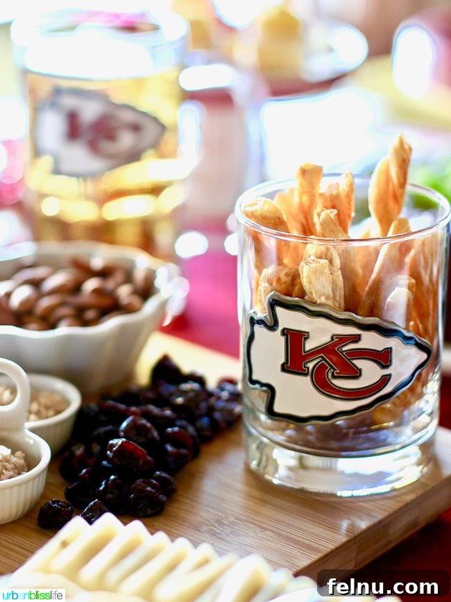 Fuel Your Fandom: Epic Game Day Eats & Drinks 10 KC Chiefs glass with party food - Game Day Food and Drink Tips