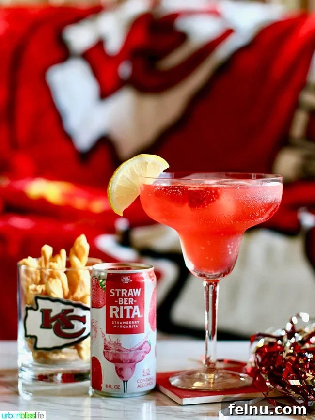 Fuel Your Fandom: Epic Game Day Eats & Drinks 13 Strawberry Lemonade Margaritas - Tips for Making Your Homegating Party a Touchdown! Ideas and Recipes on UrbanBlissLife.com
