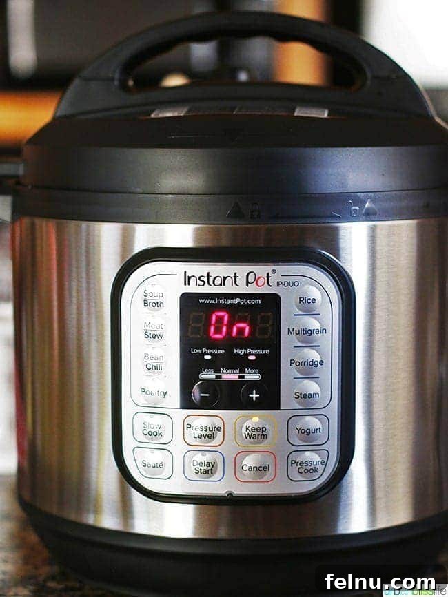 Fall-Off-The-Bone Instant Pot Ribs with Homemade BBQ 11 An 8-quart Instant Pot Duo electric pressure cooker on a kitchen counter.