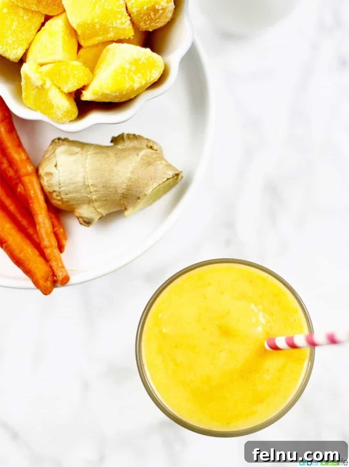 Mango Carrot Elixir 3 Ingredients for mango carrot smoothie, including ginger and carrots