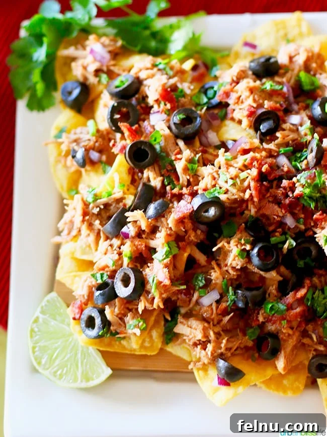 Slow Cooker Pulled Pork Fiesta Nachos 3 Loaded Pulled Pork Nachos