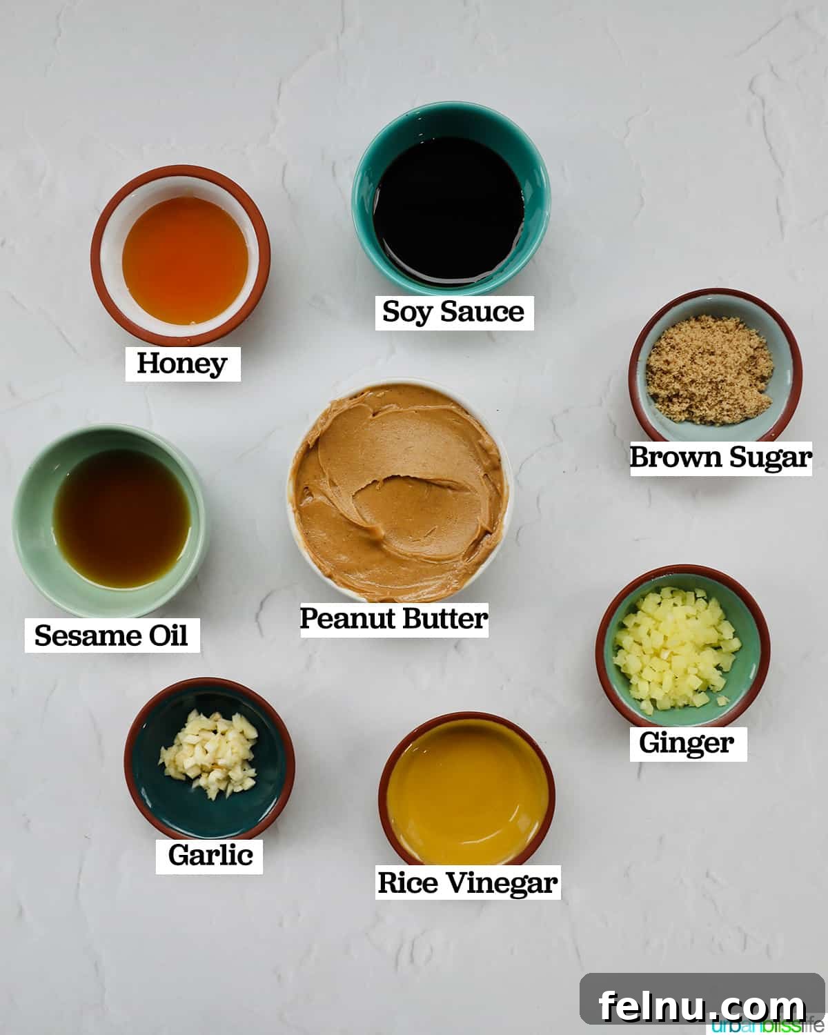Effortless Homemade Thai Peanut Sauce 4 bowls of ingredients to make homemade Thai peanut sauce