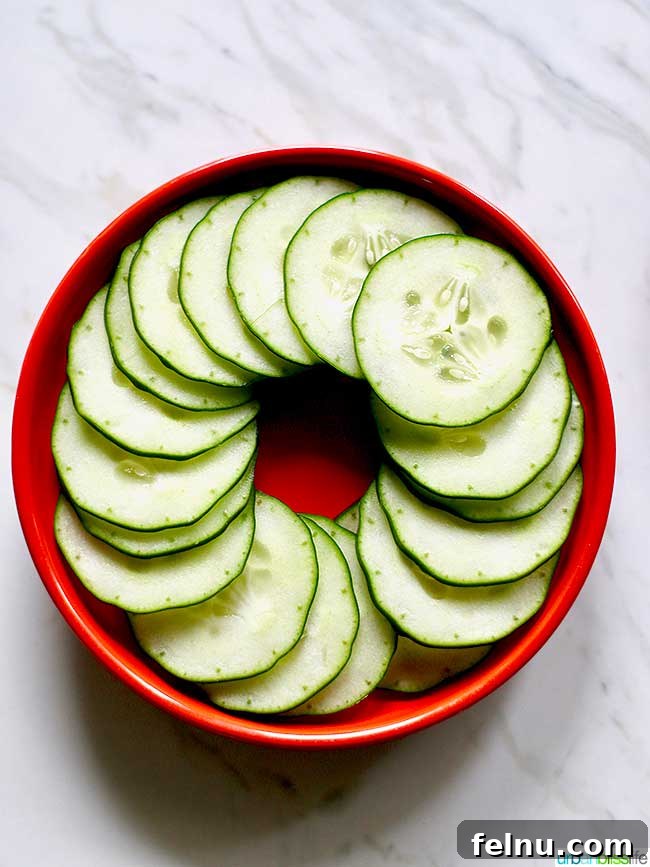 Mediterranean Cucumber and Tomato Medley 5 Sliced cucumbers on a plate