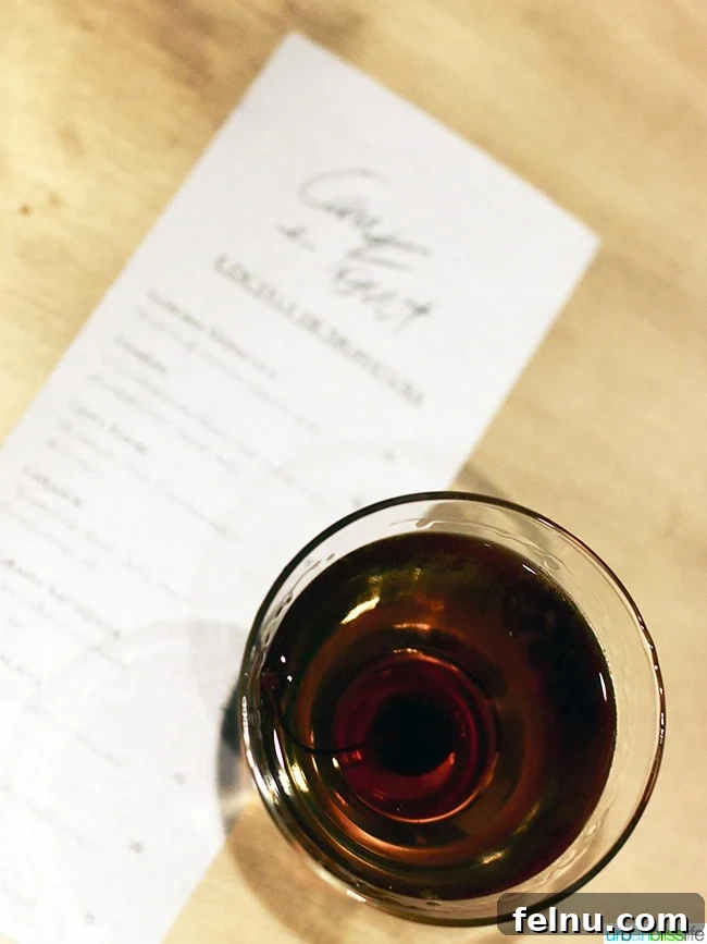 A refreshing cocktail elegantly presented on a table at Can Font Portland.
